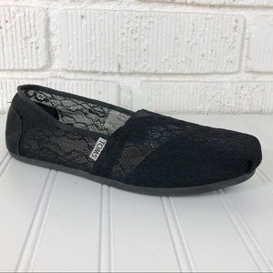 TOMS Black lace slip on flats 8.5